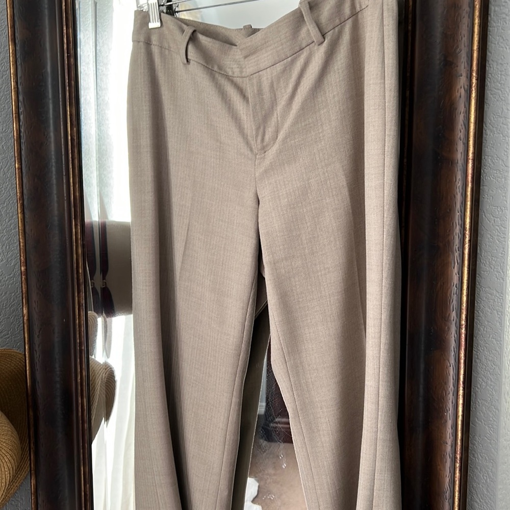 Tan dress slacks.